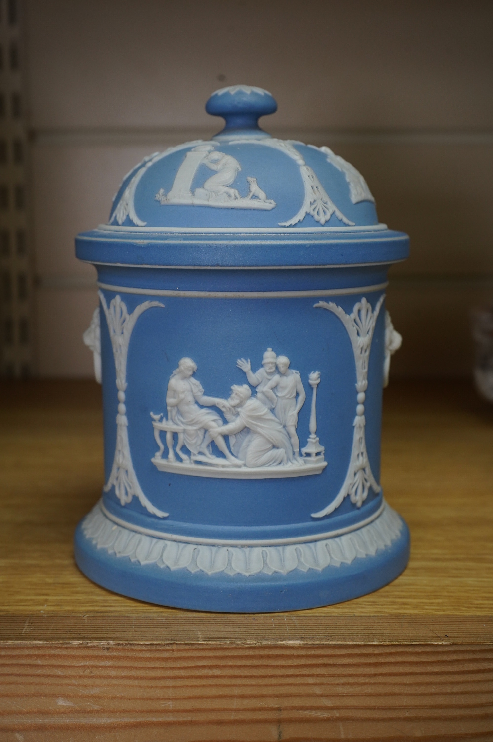 A Wedgwood jasperware tobacco jar, 17cm high. Condition - poor